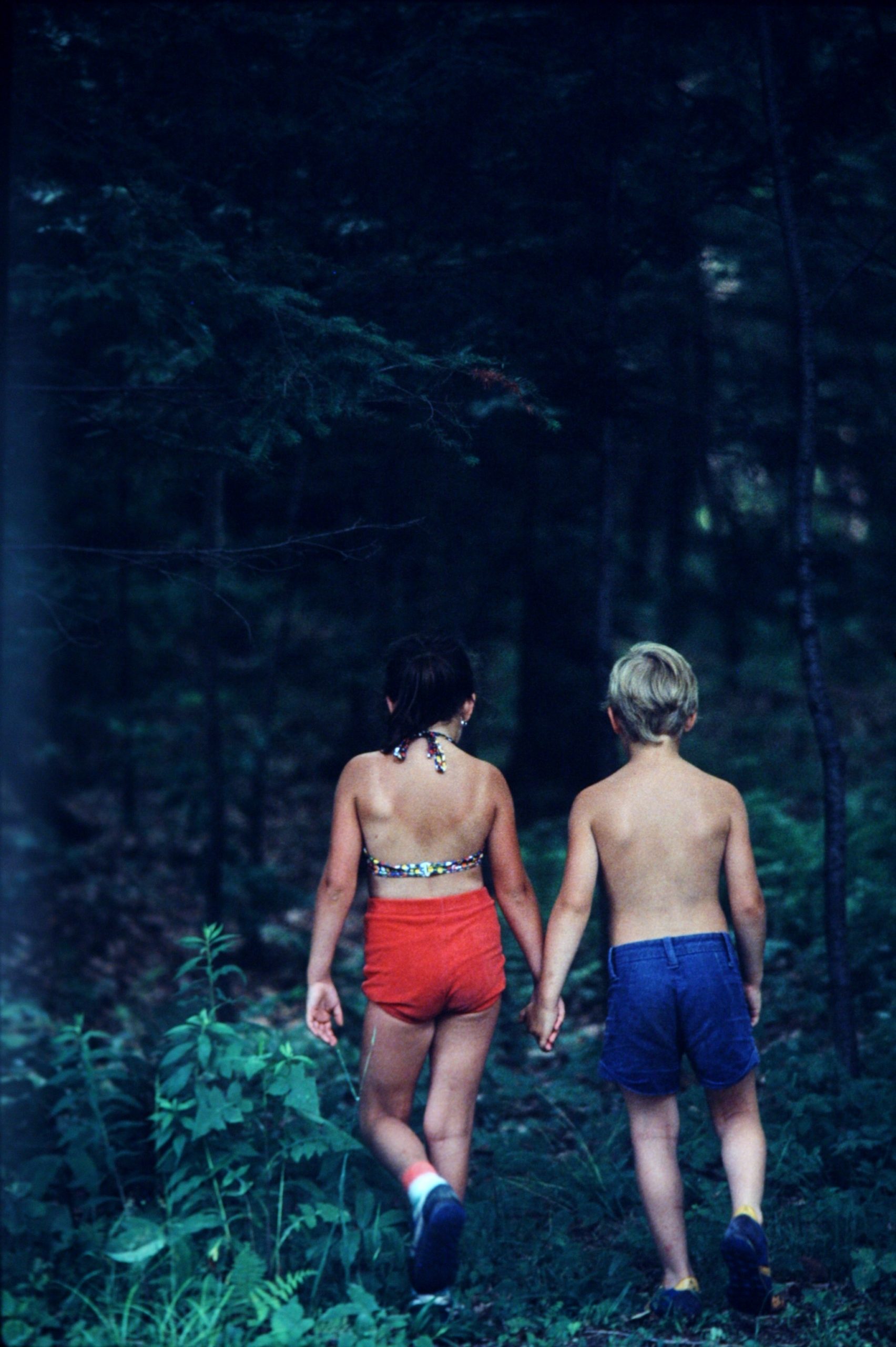 children walking in the forest